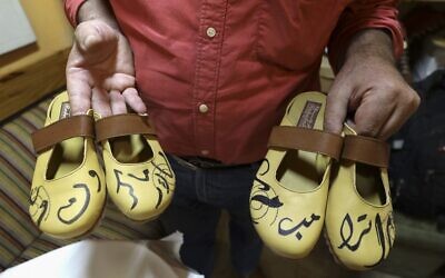 Indignant Palestinian shoemaker marks his wares with names of Trump and  Macron