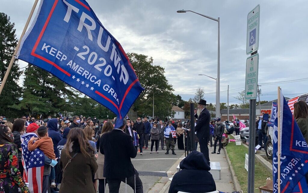 Illustrative: Rabbi Yitzchak Smith, a rabbi and lawyer who gained a following by promoting the idea that COVID-19 testing is a government ploy to hurt Orthodox Jews, addresses a rally in support of Donald Trump and religious freedom in Long Island in October 2020. (Shira Hanau/ JTA)