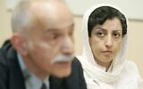 In this June 9, 2008 file photo, Iranian Narges Mohammadi, right, from the center for Human Rights Defenders, listens to Karim Lahidji, president of the Iranian league for the Defence of Human Rights, during a press conference on the Assessment of the Human Rights Situation in Iran, at the UN headquarters in Geneva, Switzerland. (AP/Keystone/Magali Girardin)