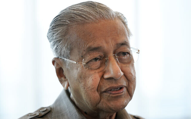 Former Malaysian prime minister Mahathir Mohamad speaks during an interview with The Associated Press in Kuala Lumpur, September 4, 2020. (AP Photo/Vincent Thian, File)
