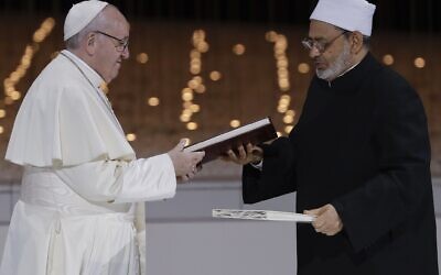 Illustrative: Pope Francis, left, and Sheikh Ahmed el-Tayeb, the grand imam of Egypt's Al-Azhar, exchange a joint statement on "human fraternity" after an interfaith meeting at the Founder's Memorial in Abu Dhabi, United Arab Emirates, Monday, Feb. 4, 2019. (AP Photo/Andrew Medichini)