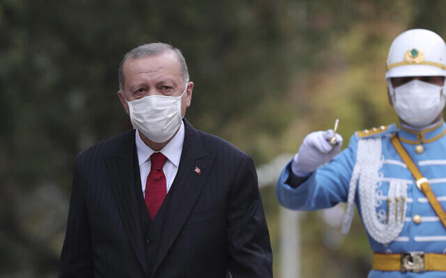 Turkey's President Recep Tayyip Erdogan inspects a military honor guard at the parliament, in Ankara, Turkey, October 1, 2020 (Turkish Presidency via AP. Pool)