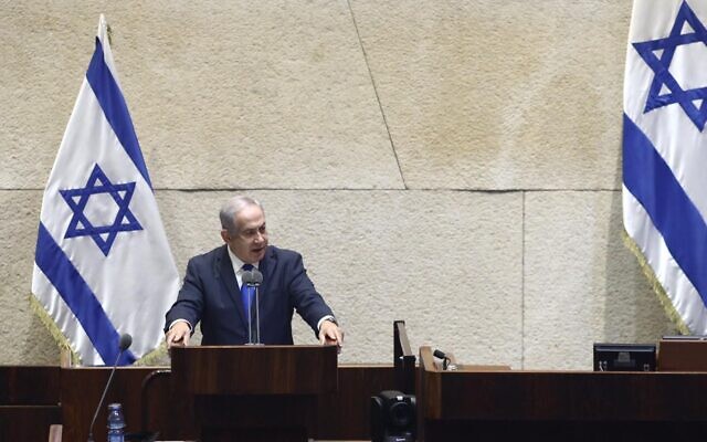 Prime Minister Benjamin Netanyahu addresses the Knesset on October 15 ahead of a vote on ratifying Israel's normalization agreement with the United Arab Emirates (Gideon Sharon/Knesset Spokesperson)