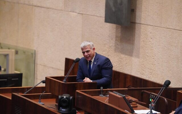Yesh Atid head MK Yair Lapid speaks at the Knesset plenum on October 28, 2020. (Shmulik Grossman/Knesset)