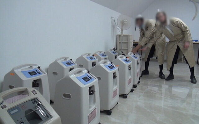 Oxygen concentrators used by a private ultra-Orthodox medical initiative treating coronavirus patients at their homes, without authorities' knowledge, October 2020. (Screenshot/Channel 12)