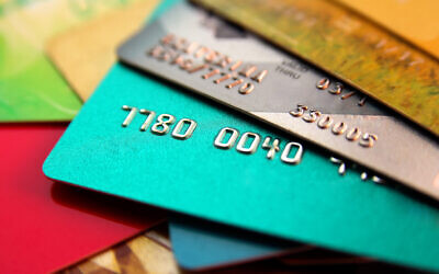 An illustrative image of a stack of credit cards. (alexialex; iStock by Getty Images)