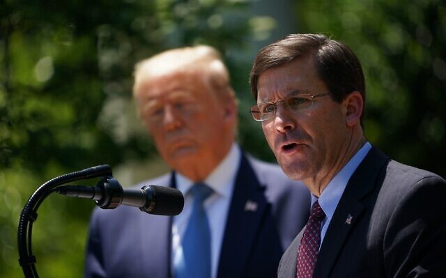 Then-US secretary of defense Mark Esper, with US President Donald Trump, speaks on vaccine development on May 15, 2020, in the Rose Garden of the White House in Washington, DC. (MANDEL NGAN / AFP)