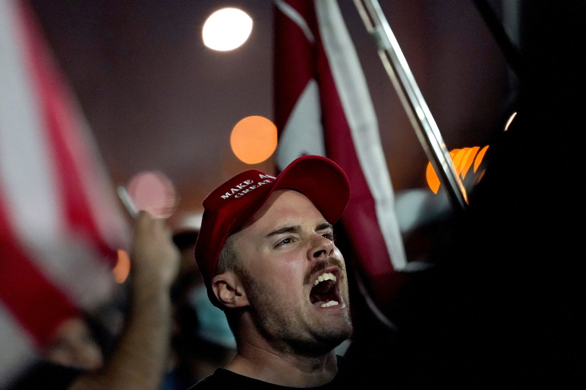 Supporters of US President Donald Trump rally outside the Maricopa County Recorders Office on November 4, 2020, in Phoenix. (AP Photo/Matt York)