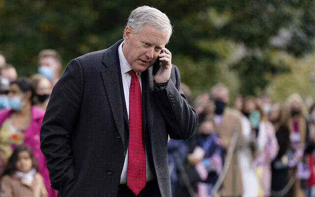 White House chief of staff Mark Meadows speaks on a phone on the South Lawn of the White House in Washington, on October 30, 2020. (AP Photo/Patrick Semansky)