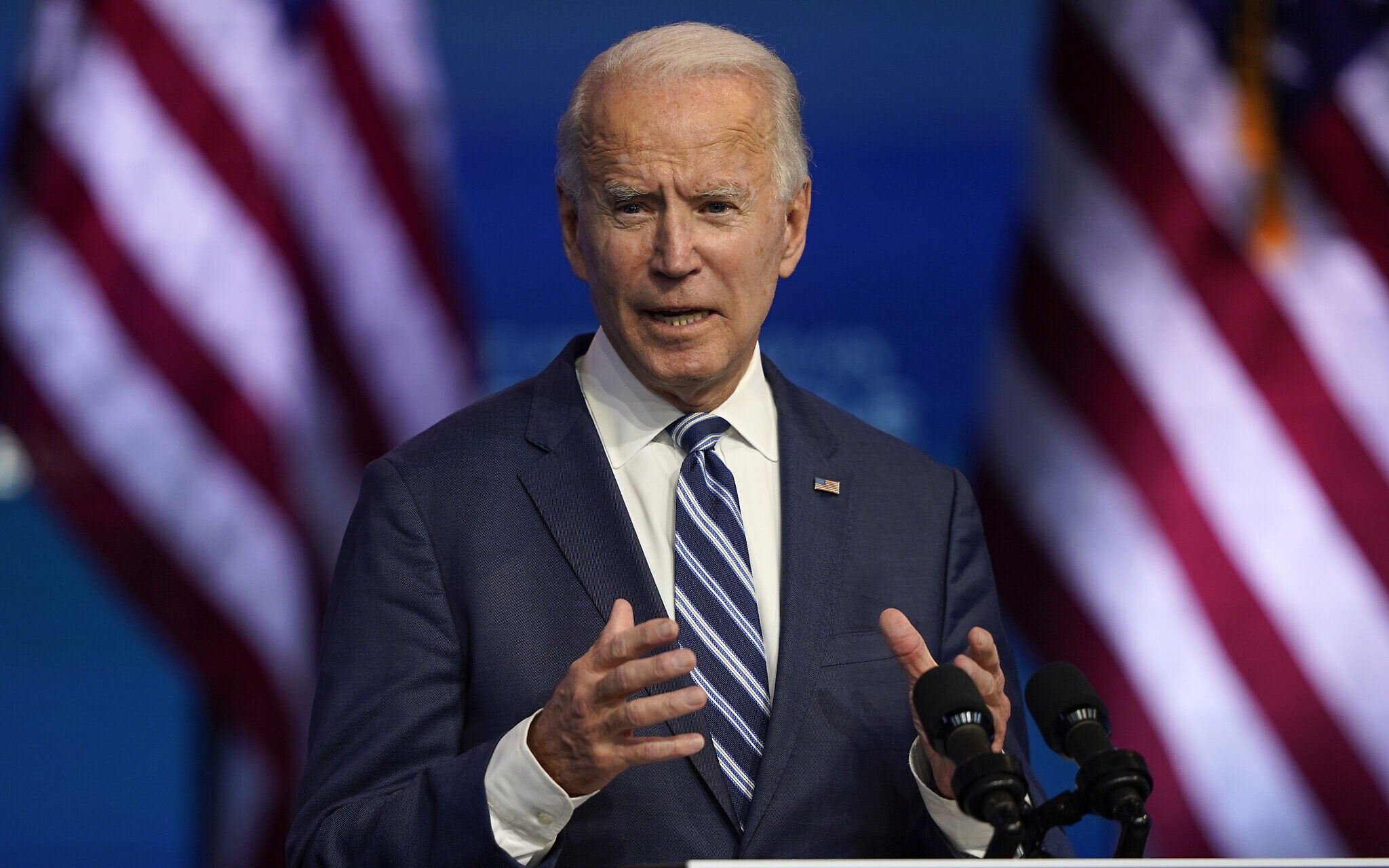 US President-elect Joe Biden speaks at The Queen theater in Wilmington, Delaware, November 10, 2020, (AP Photo/Carolyn Kaster)