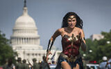 This image released by Warner Bros. Pictures shows Gal Gadot as Wonder Woman in a scene from 'Wonder Woman 1984.' (Clay Enos/Warner Bros Pictures via AP)