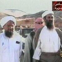 This television image released by Qatar's Al-Jazeera television broadcast on Friday Oct.5, 2001 is said to show the most recent images of Osama bin Laden, right. At left is bin Laden's top lieutenant, Egyptian Ayman al-Zawahiri (AP Photo/Courtesy of Al-Jazeera via APTN)