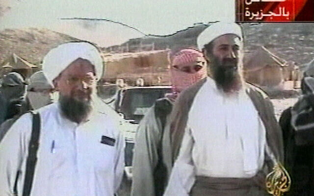 This television image released by Qatar's Al-Jazeera television broadcast on Friday Oct. 5, 2001 is said to show the most recent images of Osama bin Laden, right. At left is bin Laden's top lieutenant, Egyptian Ayman al-Zawahiri (AP Photo/Courtesy of Al-Jazeera via APTN)
