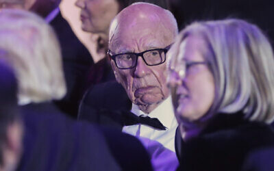 Rupert Murdoch, center, Chairman of Fox News Channel with US Donald Trump, left (with back to camera), Australian Prime Minister Malcolm Turnbull and his wife Lucy Turnbull, right, during dinner aboard the USS Intrepid, a decommissioned aircraft carrier docked in the Hudson River in New York on May 4, 2017. (AP/Pablo Martinez Monsivais)