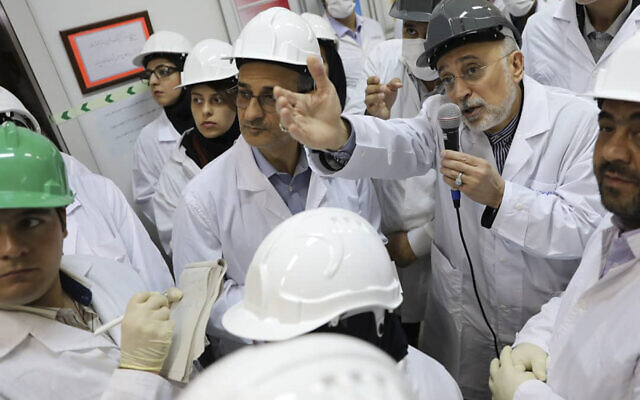 In this photo released on Monday, Nov. 4, 2019 by the Atomic Energy Organization of Iran, Ali Akbar Salehi, head of the organization, speaks with media while visiting the Natanz enrichment facility, in central Iran. (Atomic Energy Organization of Iran via AP)