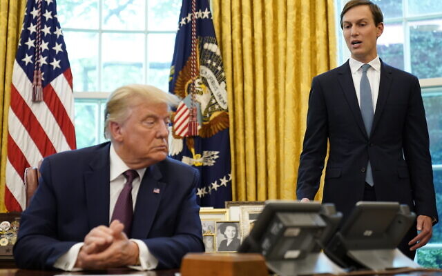 US President Donald Trump, left, listens as Jared Kushner speaks in the Oval Office of the White House in Washington, September 11, 2020. (Andrew Harnik/AP)