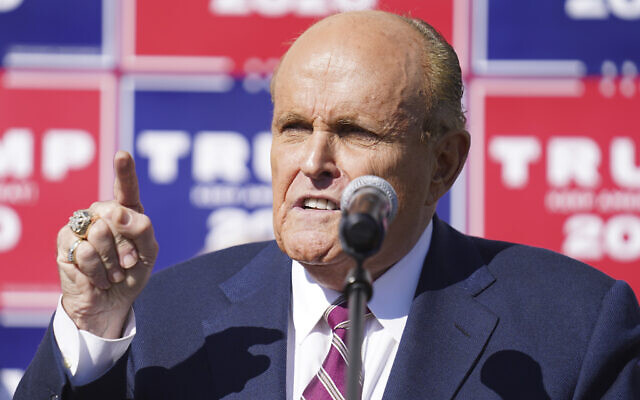 Former New York mayor Rudy Giuliani, a lawyer for US President Donald Trump, speaks during a news conference on legal challenges to vote counting in Pennsylvania, in Philadelphia, November 7, 2020. (John Minchillo/AP)