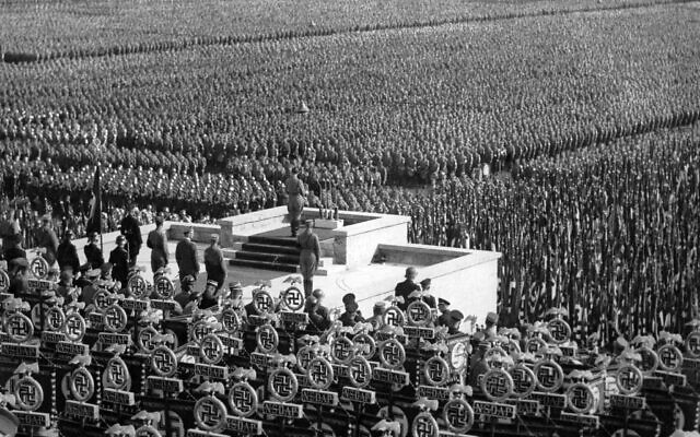 Over 100,000 members of Hitler's stormtroopers at the huge Nazi rally in the Leopold Arena in Nuremberg, on Sept. 15, 1935, listen as German Chancellor Adolf Hitler speaks. (AP Photo)