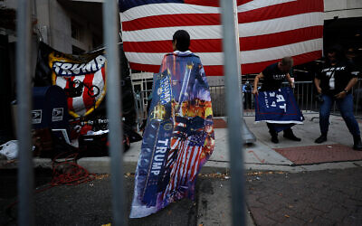Supporters of US President Donald Trump protest outside the Pennsylvania Convention Center as vote counting continues, in Philadelphia, November 9, 2020. (AP Photo/Rebecca Blackwell)
