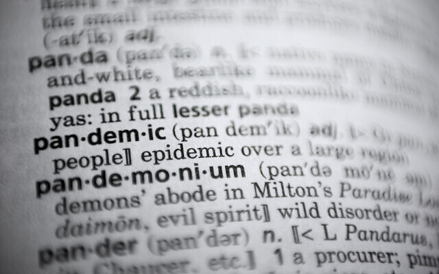 Illustrative: In this Saturday, Nov. 21, 2020, photo the word pandemic is displayed in a dictionary in Washington. Merriam-Webster on Monday announced “pandemic” as its 2020 word of the year. (AP Photo/Jenny Kane)