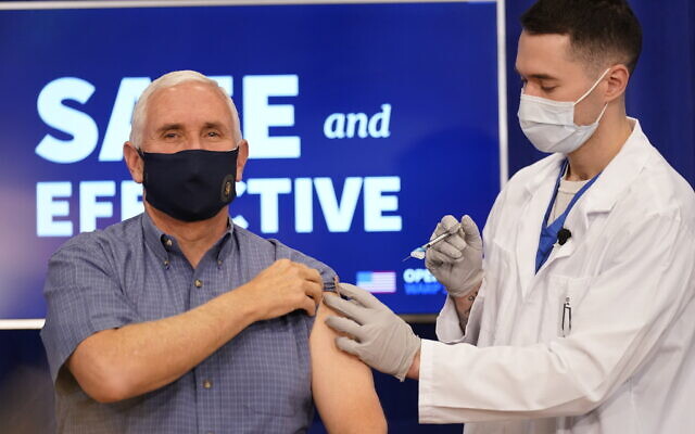 US Vice President Mike Pence receives a Pfizer-BioNTech COVID-19 vaccine shot at the Eisenhower Executive Office Building on the White House complex on December 18, 2020, in Washington.   (AP/Andrew Harnik)