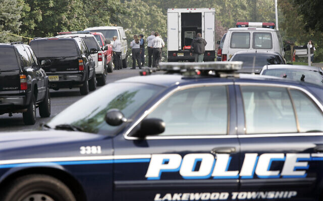 Illustrative: Investigators work at a crime scene Thursday, Sept. 24, 2009, in Lakewood, N.J.(AP Photo/Mel Evans)