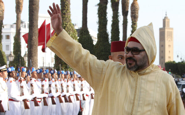 Moroccan King Mohammed VI waves to a crowd as he arrives for the opening session of the Moroccan Parliament in Rabat, Morocco, on October 12, 2018. (AP Photo/Abdeljalil Bounhar)