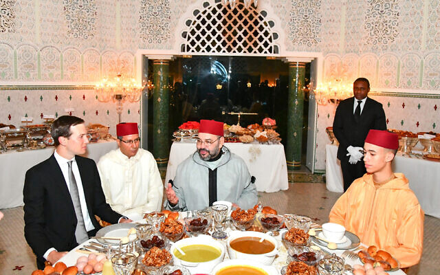 In this photo provided by the Moroccan News Agency (MAP), Moroccan King Mohammed VI, center, chats with Jared Kushner, Senior Adviser to President Donald Trump, left, as Crown Prince Moulay Hassan, right looks on before an Iftar meal, the evening meal when Muslims end their daily Ramadan fast at sunset, at the King Royal residence in Sale, Morocco, May 28, 2019. (Moroccan Royal Palace, via AP)