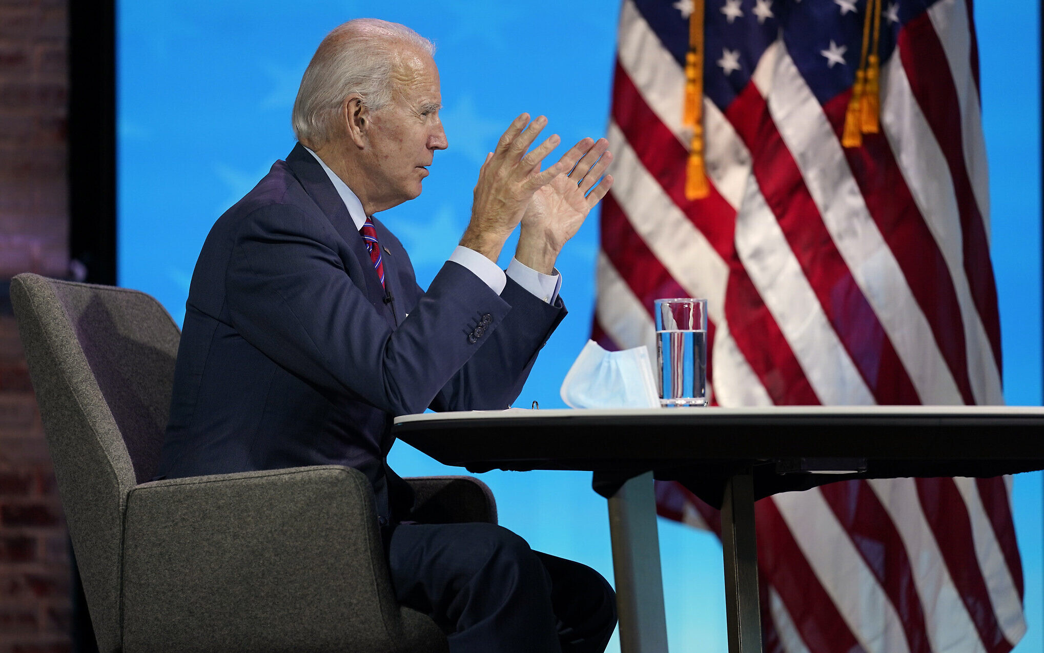 US President-elect Joe Biden participates in a virtual meeting with the National Association of Counties Board of Directors about jobs at The Queen theater, in Wilmington, Delaware, December 4, 2020. (Andrew Harnik/AP)