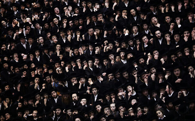 Illustrative: Ultra-Orthodox Jewish men at an event in Jerusalem on February 10, 2020. (Aharon Krohn/Flash90)