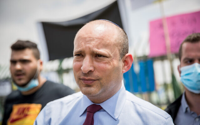 Yamina leader Naftali Bennett at a protest against the state’s intention to close the Hilla Project, outside the Knesset in Jerusalem on August 12, 2020. (Yonatan Sindel/Flash90)