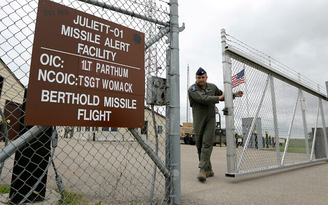 Illustrative: A US Air Force officer closes the gate at an ICBM launch control facility at an air force base in the countryside outside Minot, North Dakota, June 24, 2014. (AP Photo/Charlie Riedel)
