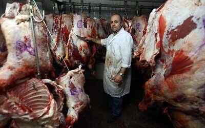 Illustrative: A butcher in Jerusalem, April 26, 2010. (Abir Sultan/Flash90)