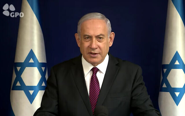 Prime Minister Benjamin Netanyahu issues a Christmas greeting in a video posted to his social media channels on December 23, 2020. (Screenshot/YouTube)