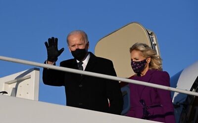 US President-elect Joe Biden and incoming First Lady Jill Biden arrive at Joint Base Andrews in Maryland on January 19, 2021, one day ahead of his inauguration as 46th President of the US. (Photo by JIM WATSON / AFP)