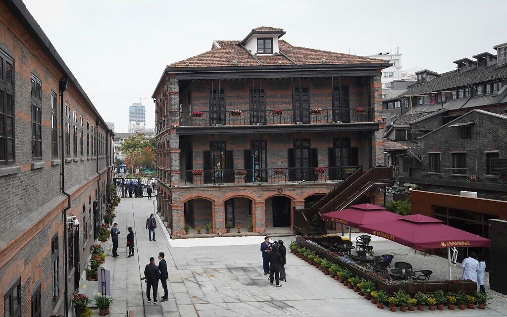 People visiting the site of a former synagogue at the Shanghai Jewish Refugees Museum on the day the museum reopened to the public after an expansion project in Shanghai, December 8, 2020. (Photo by STR / AFP)