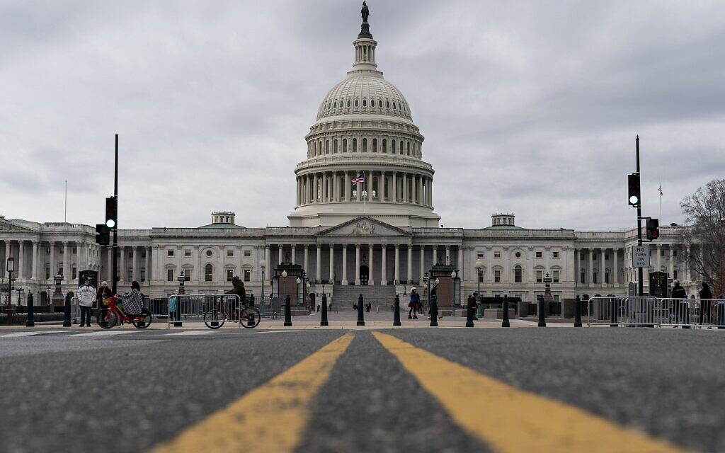 Clouds pass over the Capitol dome on December 31, 2020, in Washington, DC. (Joshua Roberts/Getty Images/AFP)