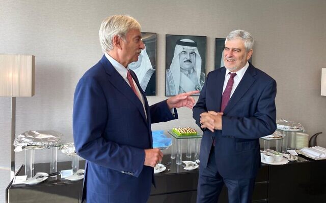Bank Hapoalim CEO Dov Kotler, right, meets with CEO of the National Bank of Bahrain Jean-Christophe Durand in Manama, Bahrain in Nov. 2020 (Courtesy)