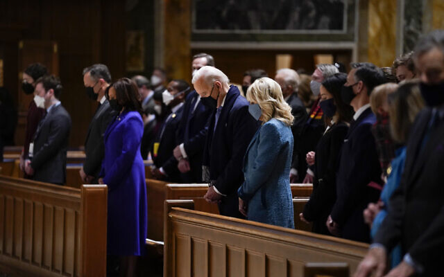 President-elect Joe Biden and his wife Jill Biden attend Mass at the Cathedral of St. Matthew the Apostle during Inauguration Day ceremonies Wednesday, Jan. 20, 2021, in Washington. (AP Photo/Evan Vucci)