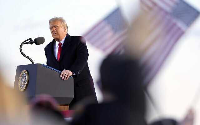 US President Donald Trump speaks before boarding Air Force One at Andrews Air Force Base, Maryland, January 20, 2021.(AP Photo/Manuel Balce Ceneta)
