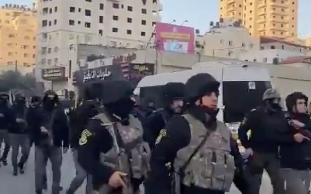 Palestinian Authority security forces enter the East Jerusalem neighborhood of Kafr Aqab following a triple homicide on January 2, 2021 (video screenshot)