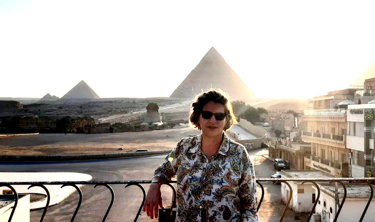 Ambassador Amira Oron in front of the Great Pyramids in Giza, Egypt, in an undated photo. The provided photo has been digitally altered by The Times of Israel for artistic effect. (Courtesy: Amira Oron)
