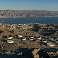 This aerial photograph, taken on February 10, 2021, shows the oil storage containers of the Eilat Ashkelon Pipeline Company (EAPC) in the mountains near Israel's Red Sea port city of Eilat. (MENAHEM KAHANA/AFP)