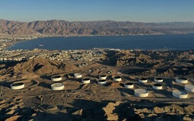 This aerial photograph, taken on February 10, 2021, shows the oil storage containers of the Eilat Ashkelon Pipeline Company (EAPC) in the mountains near Israel's Red Sea port city of Eilat. (MENAHEM KAHANA/AFP)