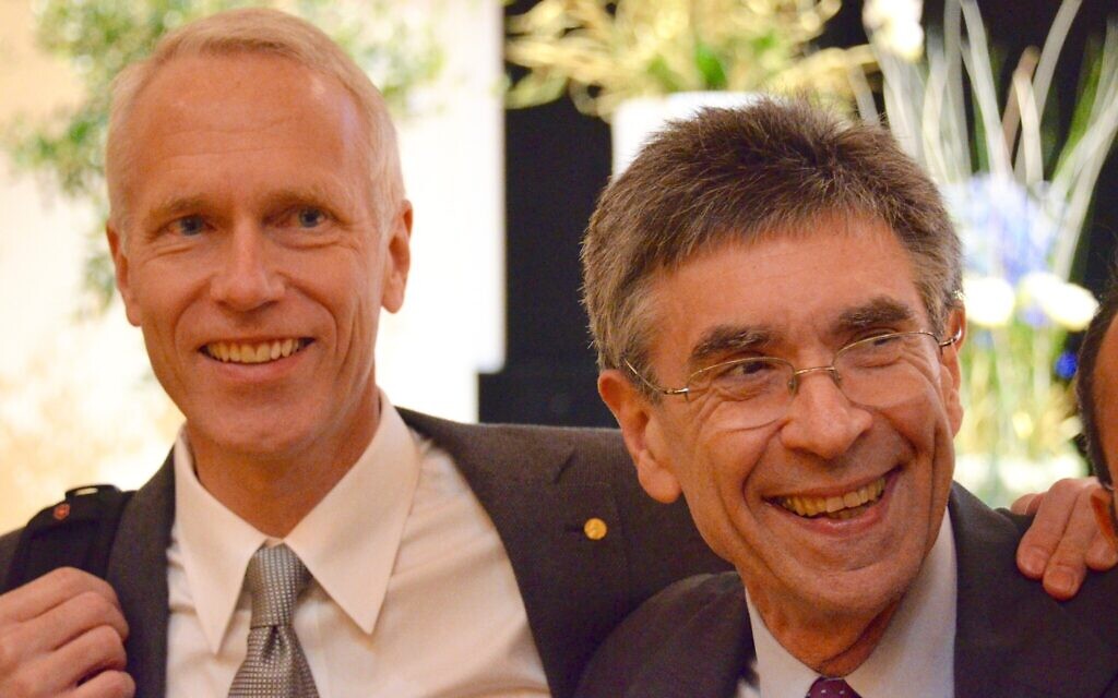 Dr. Brian Kobilka, left, with Dr. Robert Lefkowitz at the post-Nobel Prize lecture they gave. (Courtesy)