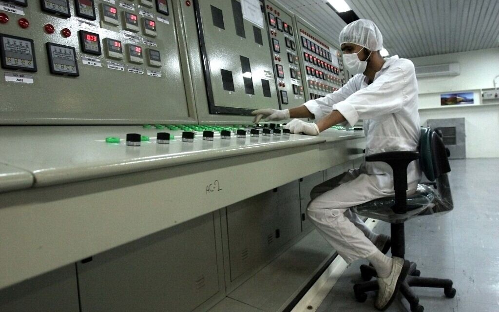 An Iranian technician works at the Uranium Conversion Facility just outside the city of Isfahan, Iran, on February 3, 2007. (AP Photo/Vahid Salemi)