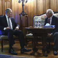In this photo released by the Russian Foreign Ministry Press Service, Russian Foreign Minister Sergey Lavrov and High Representative of the EU for Foreign Affairs and Security Policy, Josep Borrell, right, talk during their meeting in Moscow, Russia, Friday, February 5, 2021. (Russian Foreign Ministry Press Service via AP)