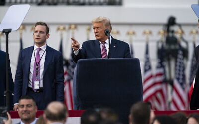 Then-US president Donald Trump talks with Deputy Campaign Manager for Presidential Operations Max Miller, left, before his speech to the Republican National Convention on the South Lawn of the White House, Aug. 27, 2020, in Washington. (AP Photo/Evan Vucci)