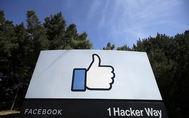The thumbs-up 'Like' logo is shown on a sign at Facebook headquarters in Menlo Park, California, April 14, 2020. (AP/Jeff Chiu, File)