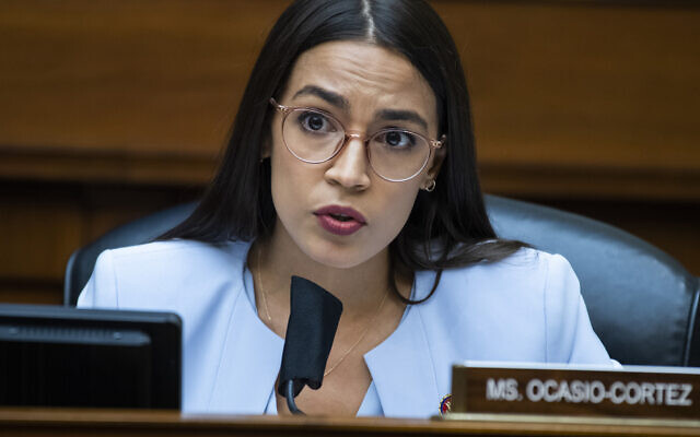 In this August 24, 2020, file photo, US Rep. Alexandria Ocasio-Cortez asks questions during a House Oversight and Reform Committee hearing on Capitol Hill, in Washington. (Tom Williams/Pool Photo via AP, File)